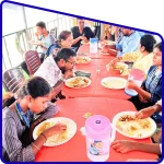 gangasagar group tour package pilgrims travelers together taking lunch on boat