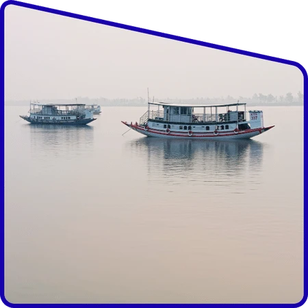 sundarban adventure trip boat stay at night on river.