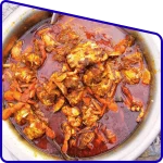 Traditional Sundarban crab curry served in a village-style plate during adventure tour