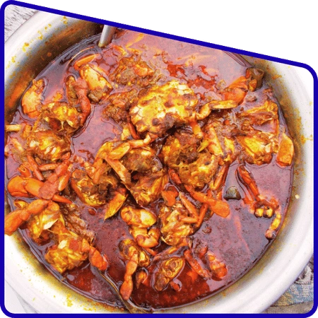 Traditional Sundarban crab curry served in a village-style plate during adventure tour