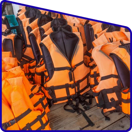 Tourists wearing life jackets during boat ride in Sundarban
