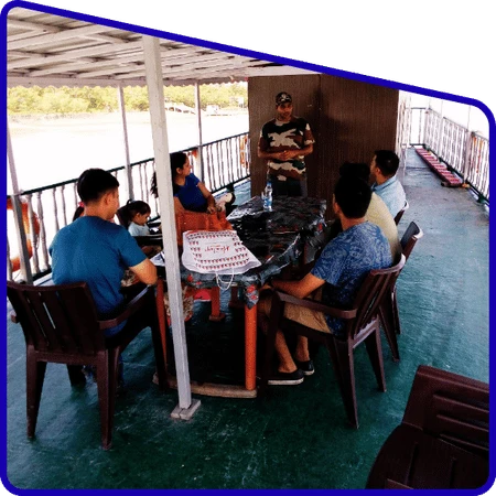 Tour guide explaining Sundarban wildlife